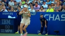 Caroline Wozniacki gets hair stuck around racket -us open 2014
