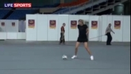 Maria Sharapova playing football
