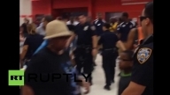 USA: NYPD officers brutally arrest black male
