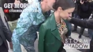 Miranda Kerr kiss attacked by prankster Vitalii Sediuk at Louis Vuitton Fashion Show in Paris
