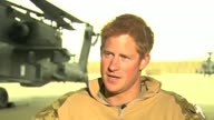 Prince Harry runs for an ice cream van during Afghanistan interview