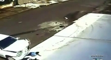 Kid escapes unharmed after being run over by a car
